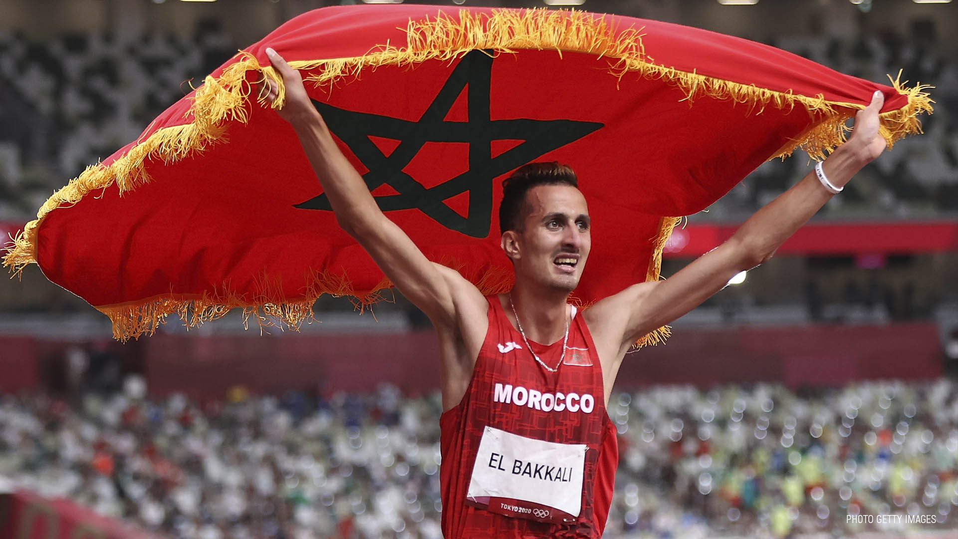 الملك يهنّئ البقالي على إنجازه الأولمبي وتشريف راية المغرب